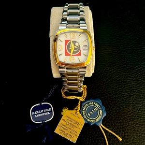 Men’s stainless steel and 18k gold watch with date. New and never worn.
